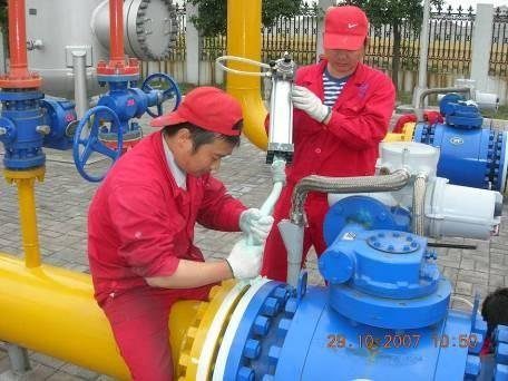 Buried valves and flanges in a gas distribution chamber
